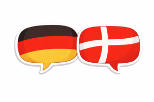 Zwei Sprechblasen, eine mit der deutschen Flagge und die andere mit der dänischen Flagge, symbolisieren einen Dialog oder Austausch zwischen Deutschland und Dänemark.